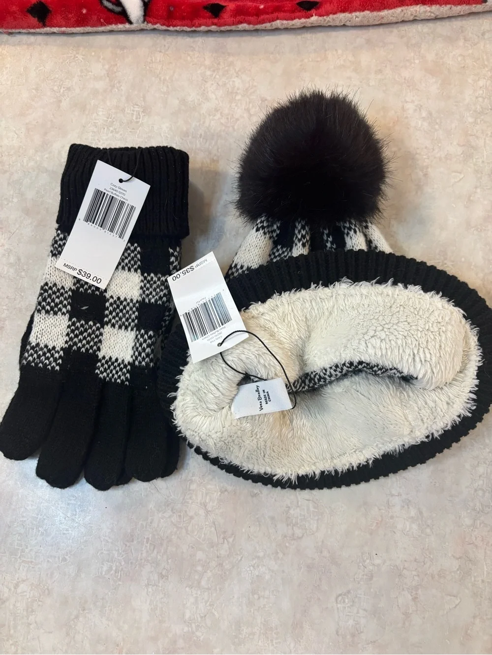Vera Bradley Black and Pearl Fleece-Lined Knit Beanie and gloves.